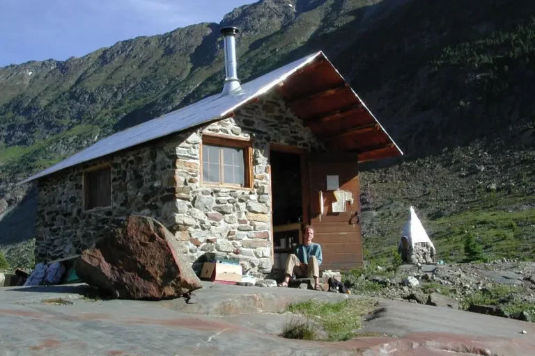 Sitting outside of great cairn hut