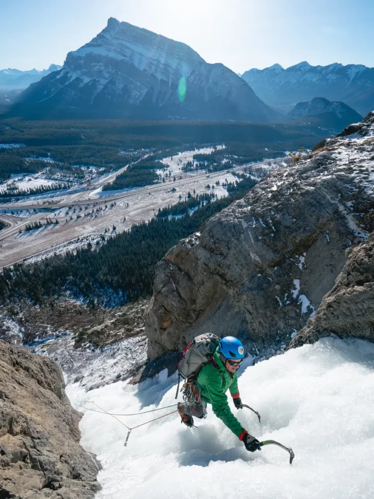 Ice Climber with Mt Rundle in background